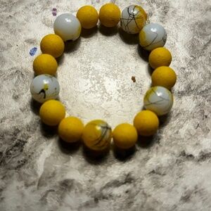 White and yellow bracelet